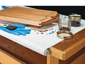 Workbench with roller shade
